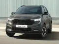 Szary Kia Sonet X-Line z nowoczesnym grillem i światłami LED, gotowy na miejskie przygody.