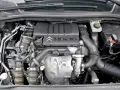 Silnik Citroen 1.6 HDi 16V z widocznymi elementami układu dolotowego i osprzętu.
