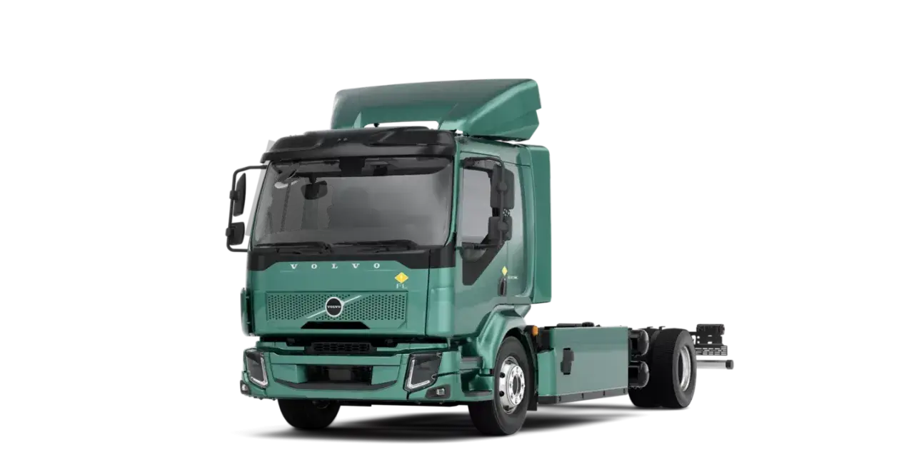 Zielony Volvo FL, elektryczny, gotowy do pracy.