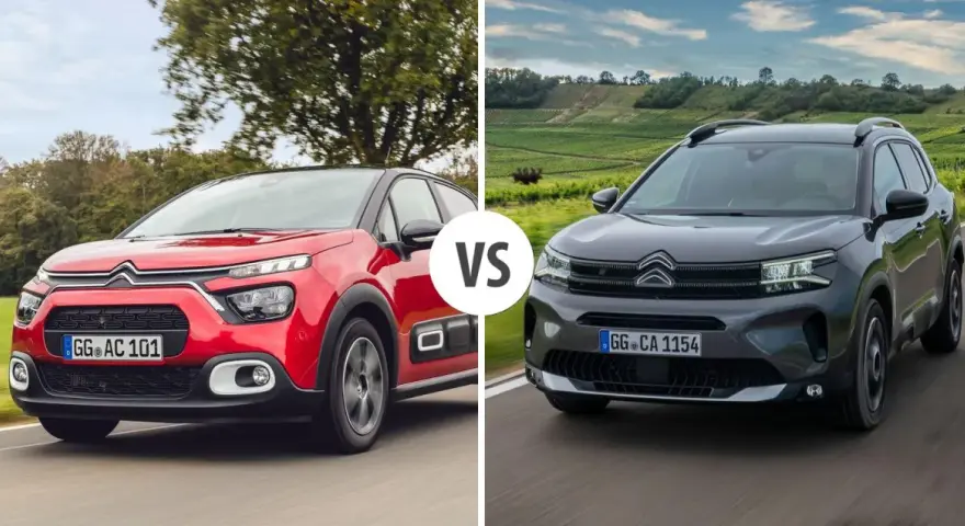 Dwa modele Citroen SUV: czerwony i ciemnoszary, jadące po drodze.