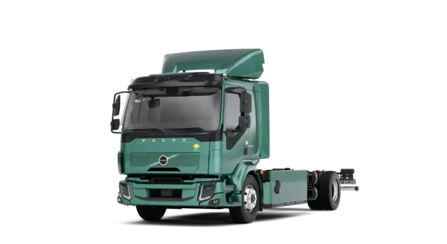 Zielony Volvo FL, elektryczny, gotowy do pracy.