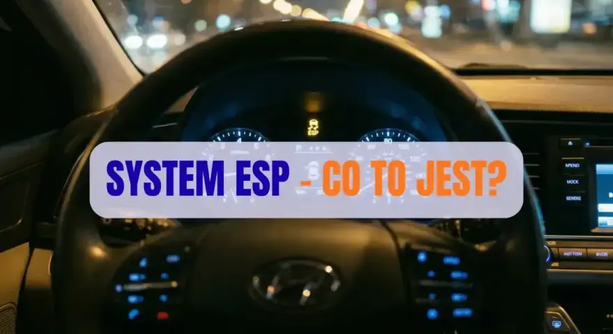 Kierownica samochodu nocą. Na desce rozdzielczej świeci kontrolka ESP, a na ekranie napis "SYSTEM ESP - CO TO JEST?".