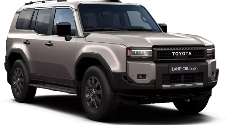 Szary Toyota Land Cruiser 300 z czarnym grillem i napisami TOYOTA LAND CRUISER.